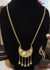 Vintage gold-toned necklace Crescent moon pendant with a hammered finish.