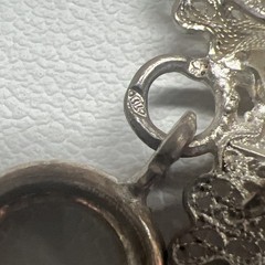 Antique Silver Bracelet featuring Finely detailed Filigree Flowers