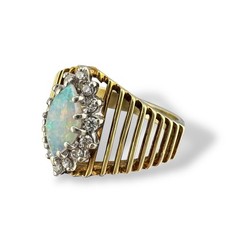Vintage circa 1970s 14k Yellow Gold Marquise Opal Ring with Diamond Halo