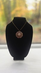 Vintage gold toned filigree pendant necklace with pink faux fire cabochon opal