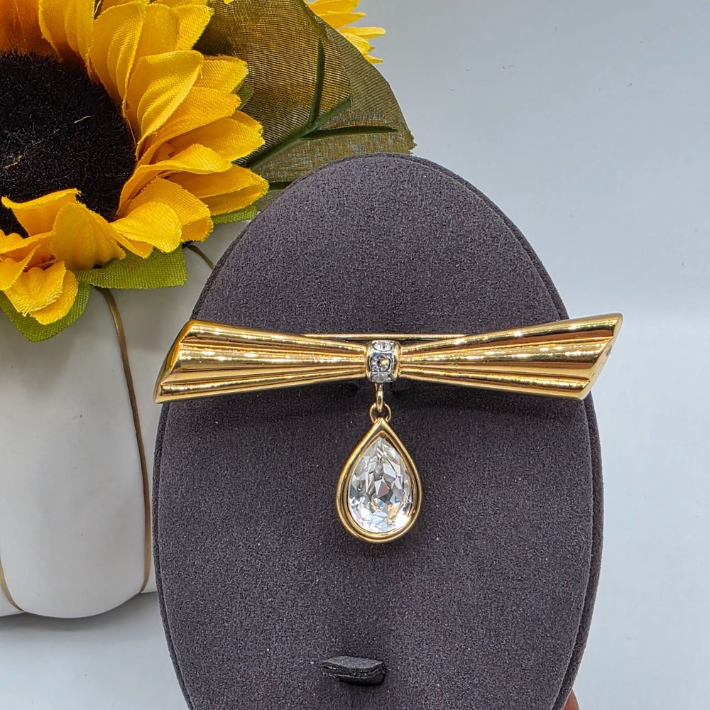 Monet Gold Tone Bow Brooch with Teardrop Crystal Dangle Pin Vintage Signed