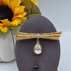 Monet Gold Tone Bow Brooch with Teardrop Crystal Dangle Pin Vintage Signed