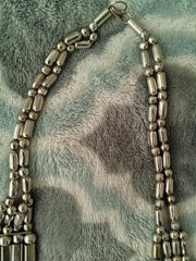 Vintage multi-strand tribal silvertone necklace with stacked bars and beads