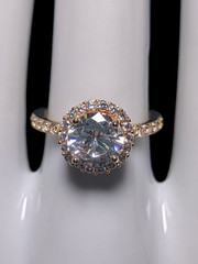 Vintage Inspired Round Cut Simulated Diamond Solitaire with Simulated Diamond Ha