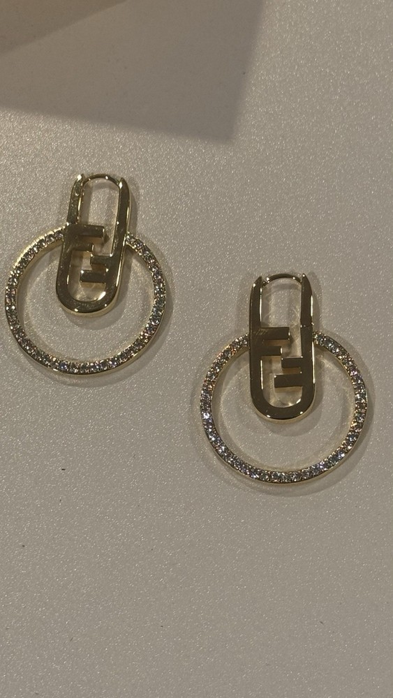 Fendine brooch earrings with its box measures 1.5 inches