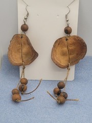 A set of tribal-style wooden and metal jewelry pendant necklace 26in Earrings.