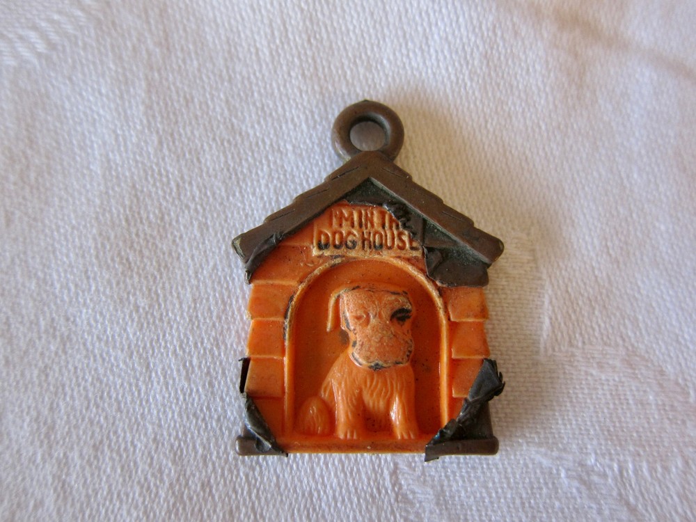 Vintage mid-century “I’m in the dog house” plastic pendant