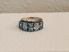 Vintage CNA sterling silver ring with five oval-cut blue topaz stones size 5