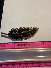 “Hollycraft” vintage multi-colored rhinestone feather or leaf shaped brooch. #4