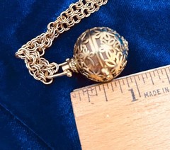 Filigree Aromatherapy Diffuser Necklace.