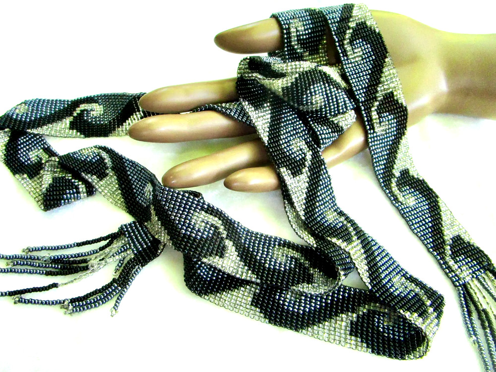 vintage 56-inch necklace or belt, beaded in blue, white, black wave pattern