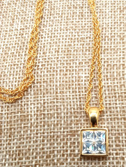 Vtg Givenchy Gold Tone Sm Pendant Channel Set Cubic Zirconia Reverse Side Logo