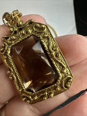 32 in.³ triple strand Goldette amber colored faceted glass necklace
