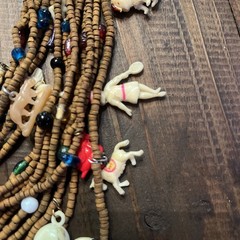 Vintage one of a kind wood bead Necklace w/ tons of celluloid charms unique cool