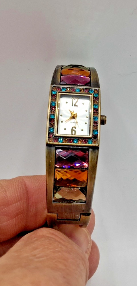 “Vintage” Quartz Spring, Ladies Gold Tone Jeweled Cuff Bracelet Analog Watch.