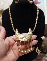 Vintage gold-toned necklace Crescent moon pendant with a hammered finish.