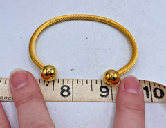 VTG Gold-tone twisted cable ball tip bangle bracelet