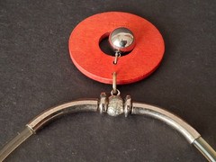 Aarikka Finland necklace with a vibrant red wooden ring pendant