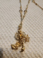 Vintage Kirk’s Folly Goldtone And Rhinestone Cherub Dangle Pendant Necklace.