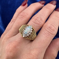 Vintage circa 1970s 14k Yellow Gold Marquise Opal Ring with Diamond Halo