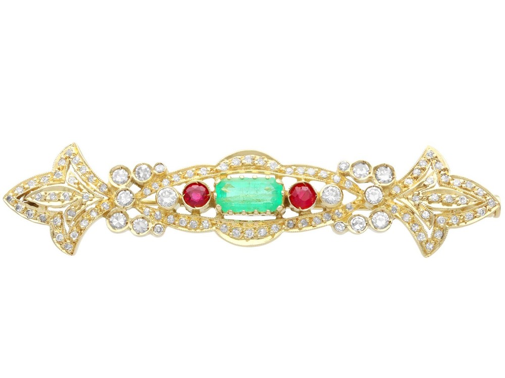 0.93ct Emerald, 0.24ct Ruby and 1.04ct Diamond, 18ct Yellow Gold Brooch