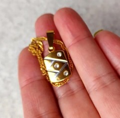Vintage pendant with chain, golden tone metal