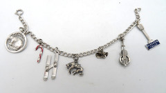 Vintage Sterling Silver Charm Bracelet with 7 Charms Ski Horse Niagara