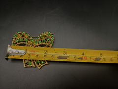 Antique Green Glass Beads Gold tone Bow Brooch Unsigned 2.25″ Diameter