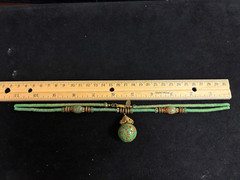 MIRIAM HASKELL UNIQUE GREEN GLASS 22″ NECKLACE WITH GOLD TONE METAL