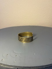 brassy gold tone fish design bangle bracelet