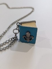 Vintage handcrafted blue leather miniature book necklace and fleur-de-lis Charm
