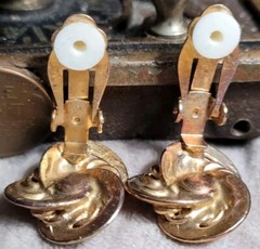 Vintage Costume jewelry clip on earrings 1980s 1990s Iridescent Gold Tone Knots
