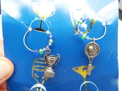 STERLING SILVER & 14KT GOLD – FILLED LOOPS TENNIS WINE CHARMS AND 2 WINE CORKS