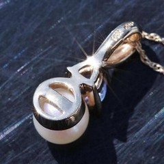 14k yellow gold pendant 6.7mm Akoya cultured pearl 0.24ct tanzanite 1.75g