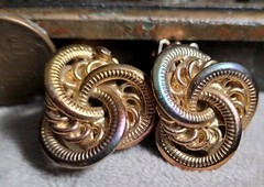 Vintage Costume jewelry clip on earrings 1980s 1990s Iridescent Gold Tone Knots