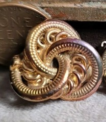 Vintage Costume jewelry clip on earrings 1980s 1990s Iridescent Gold Tone Knots