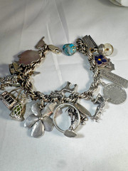 Sterling Silver Bell Trading Vintage link charm bracelet with 25 various charms