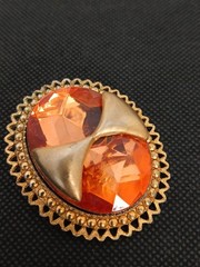 DENISE 195Os goldtone applied bow large faceted orange glass stone brooch