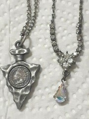 Lot of silver tone chain necklaces with rhinestone pendants. Coin, Love + Luck