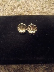 Women Silver Toned Shell Clip On Earrings