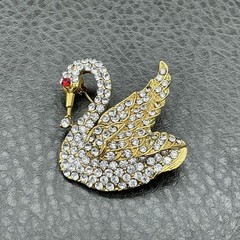 Vintage Swan Brooch Gold Tone Clear Rhinestone Bird Pin Red Eye Costume Jewelry