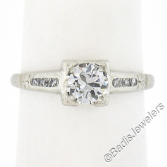Antique Platinum 0.60ctw Old European Cut Diamond Floral Work Engagement Ring