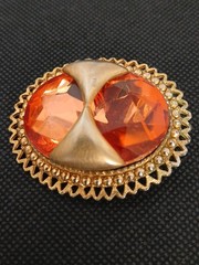 DENISE 195Os goldtone applied bow large faceted orange glass stone brooch
