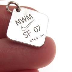 Tiffany & Co. Sterling Silver Vintage Nike Women’s Marathon 2007 Mini Pendant