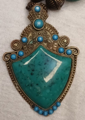 Vintage brass metal necklace with green stone made of brass and faux wood beads