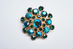 Vintage brooch Gablonz rhinestone green & blue-iridescent star.