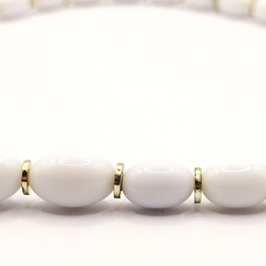 White w Gold Tone Graduated Acrylic Egg Shape Bead Professional Necklace 24 Inch