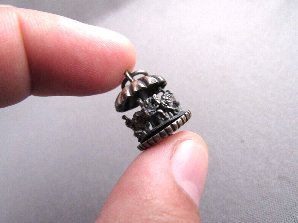VINTAGE ROUND N’ ROUND STERLING ARTICULATING 3D CAROUSEL CHARM PENDANT
