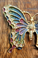 Vintage Butterfly Brooch features a Gold Tone Base w/ Enamel- Blue Green Purple