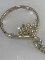 Vintage Magnifier Pendant Necklace. Gold tone. Made in USA in 1960’s. Hangs 15”